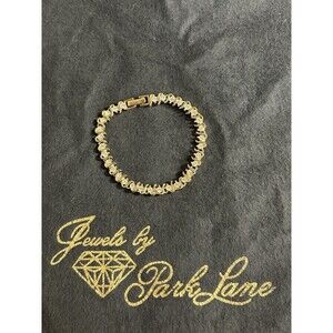 Park Lane Signed Tennis Bracelet Impression Oval CZ Gold Tone 7.5" J117
